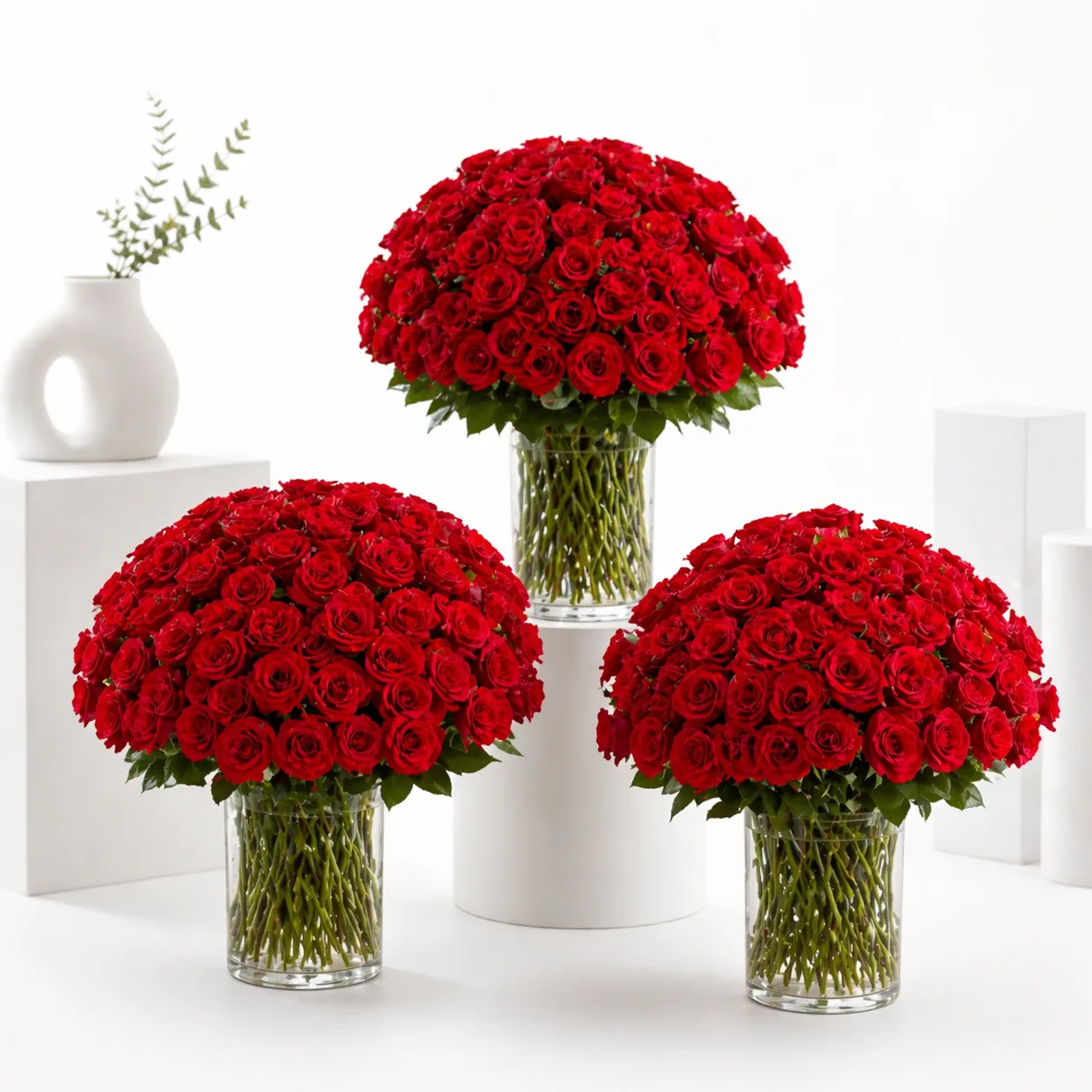 Triple Royal Crimson – 303 Red Roses Vase Arrangement