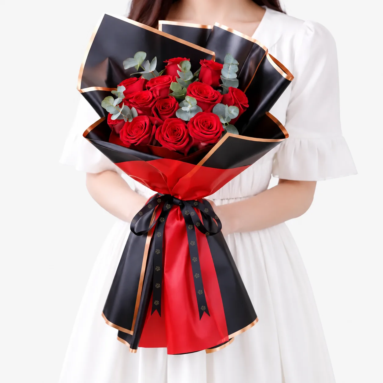 Love Bound bouquet featuring 11 fresh red roses in elegant premium wrapping.