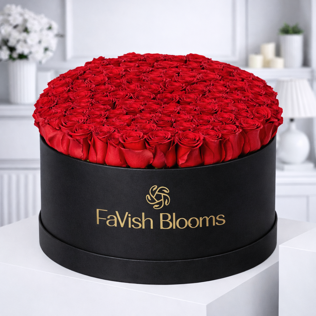 Luxury red rose hat box arrangement by FaVish Blooms
