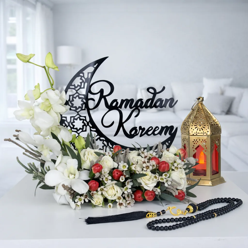 Ramadan Kareem floral arrangement with lantern and prayer beads