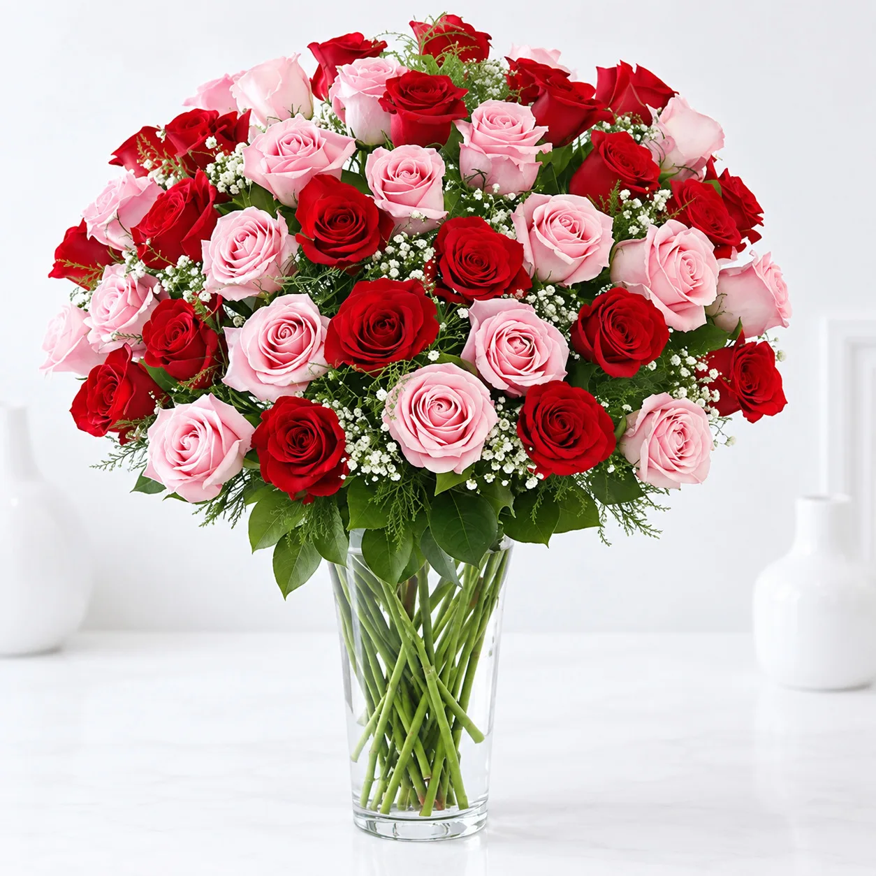 Premium 50 Red and Pink Roses Flower Arrangement by FaVish Blooms