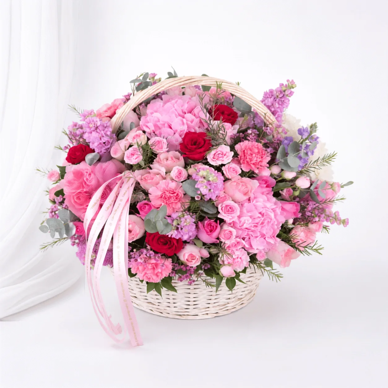 Pink Garden Harmony Basket with fresh pink flowers in Dubai by FaVish Blooms