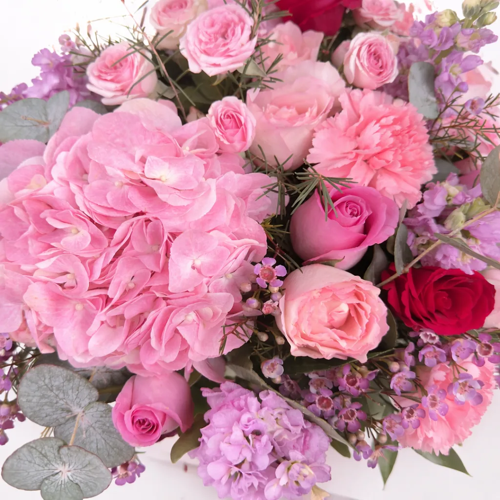 Premium pink floral basket arrangement for same day flower delivery in Dubai