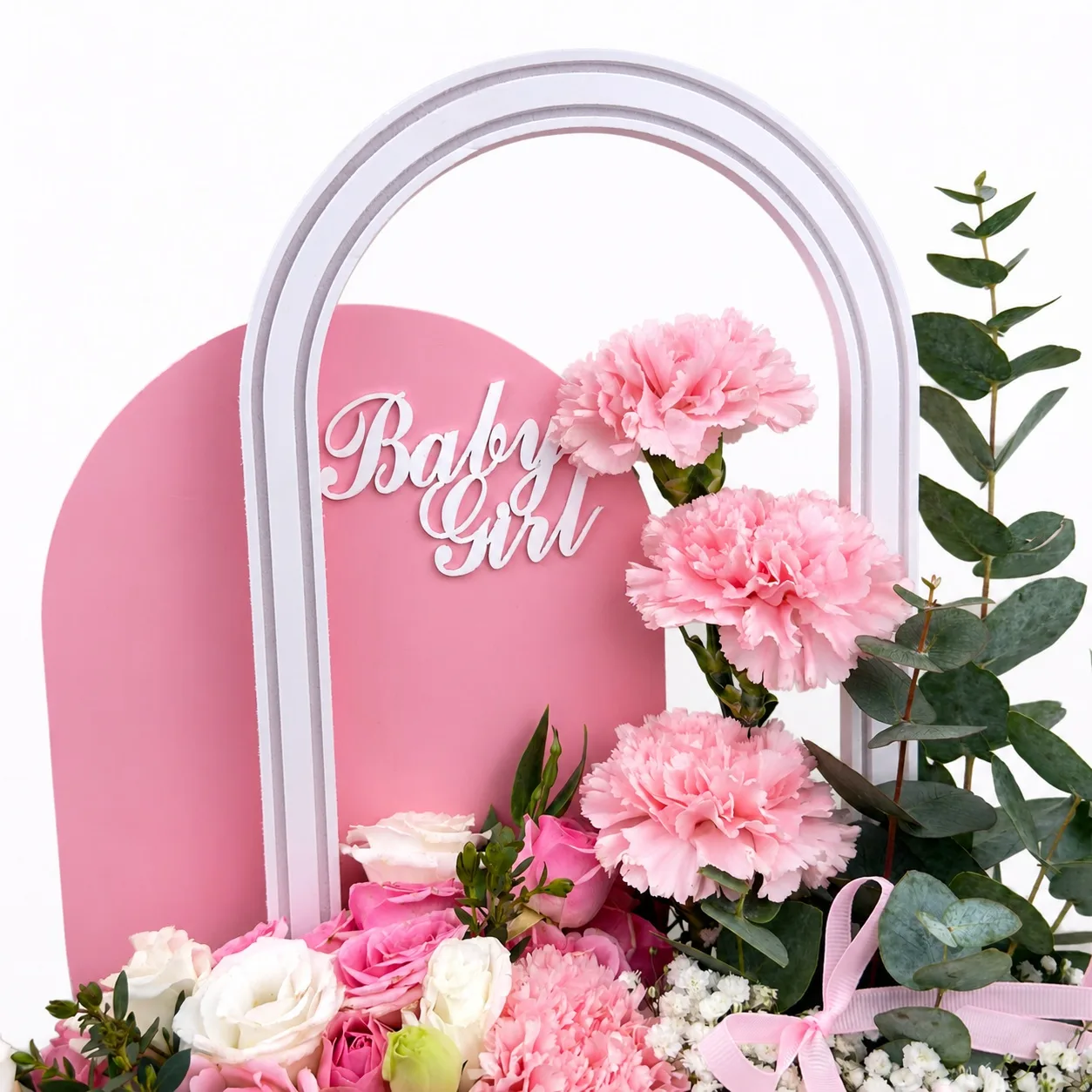 Baby Girl welcome flowers with soft pink blooms