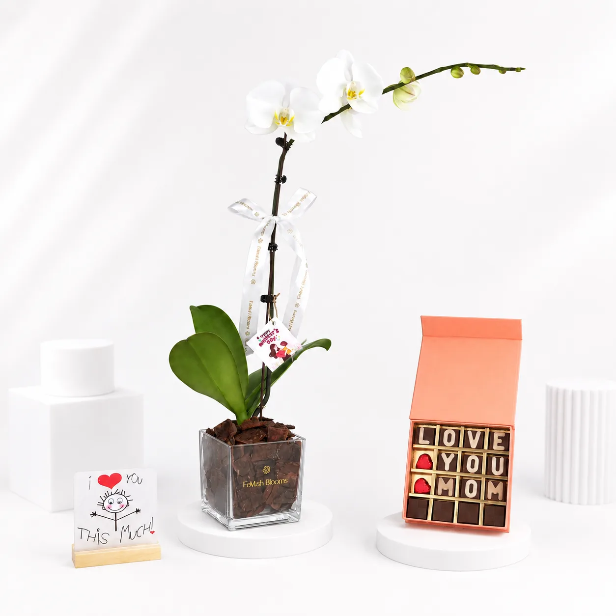 White orchid plant with Love You Mom chocolate gift