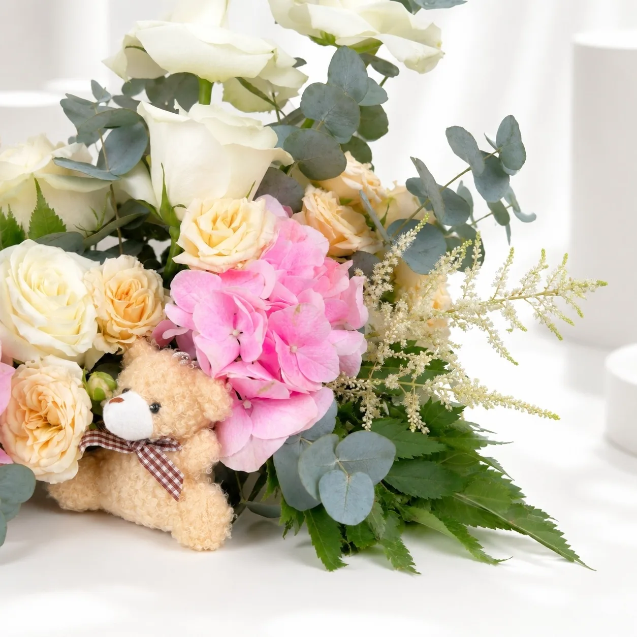 Baby girl welcome flowers with teddy bears and fresh pastel blooms