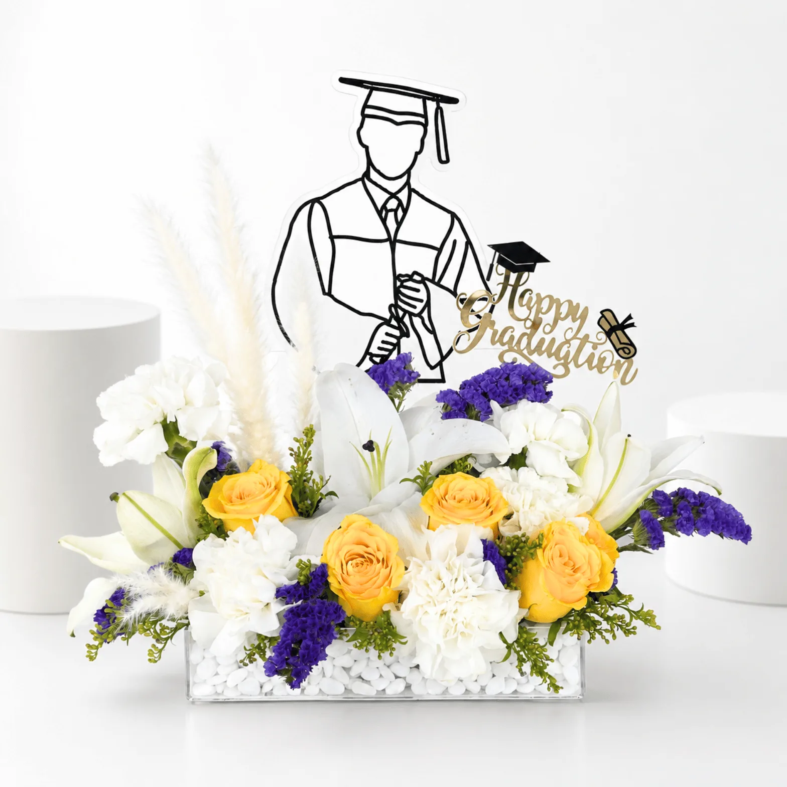 Luxury graduation flower arrangement with yellow roses and white lilies by FaVish Blooms