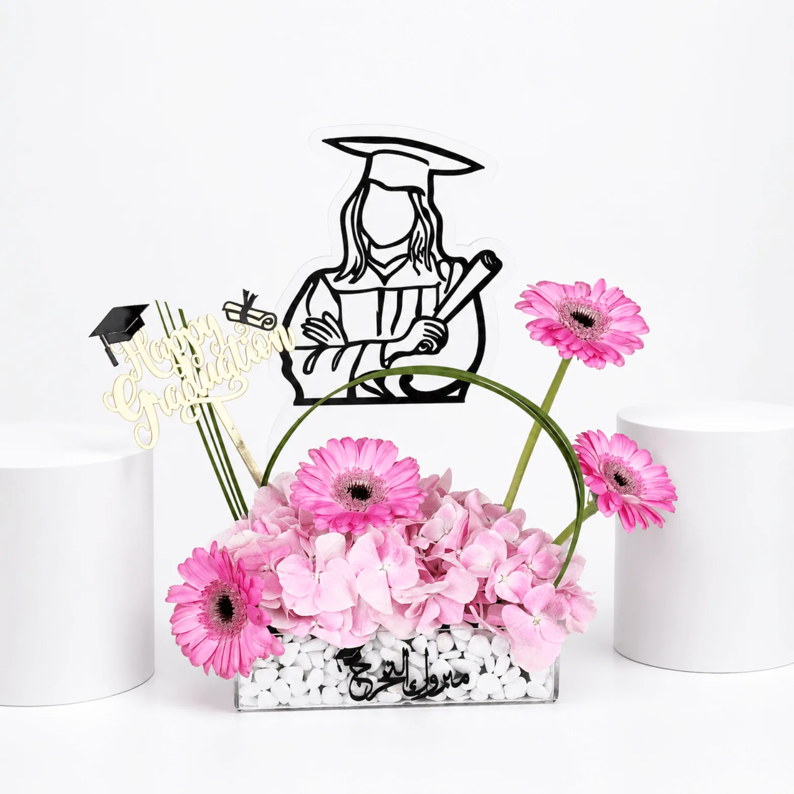 Luxury pink graduation floral arrangement with gerberas and hydrangeas by FaVish Blooms