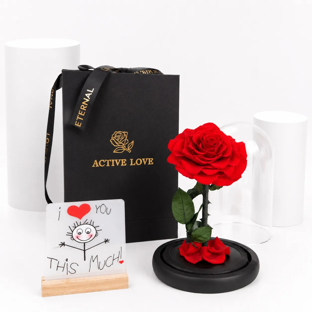 Preserved red rose in glass dome with romantic table topper gift display