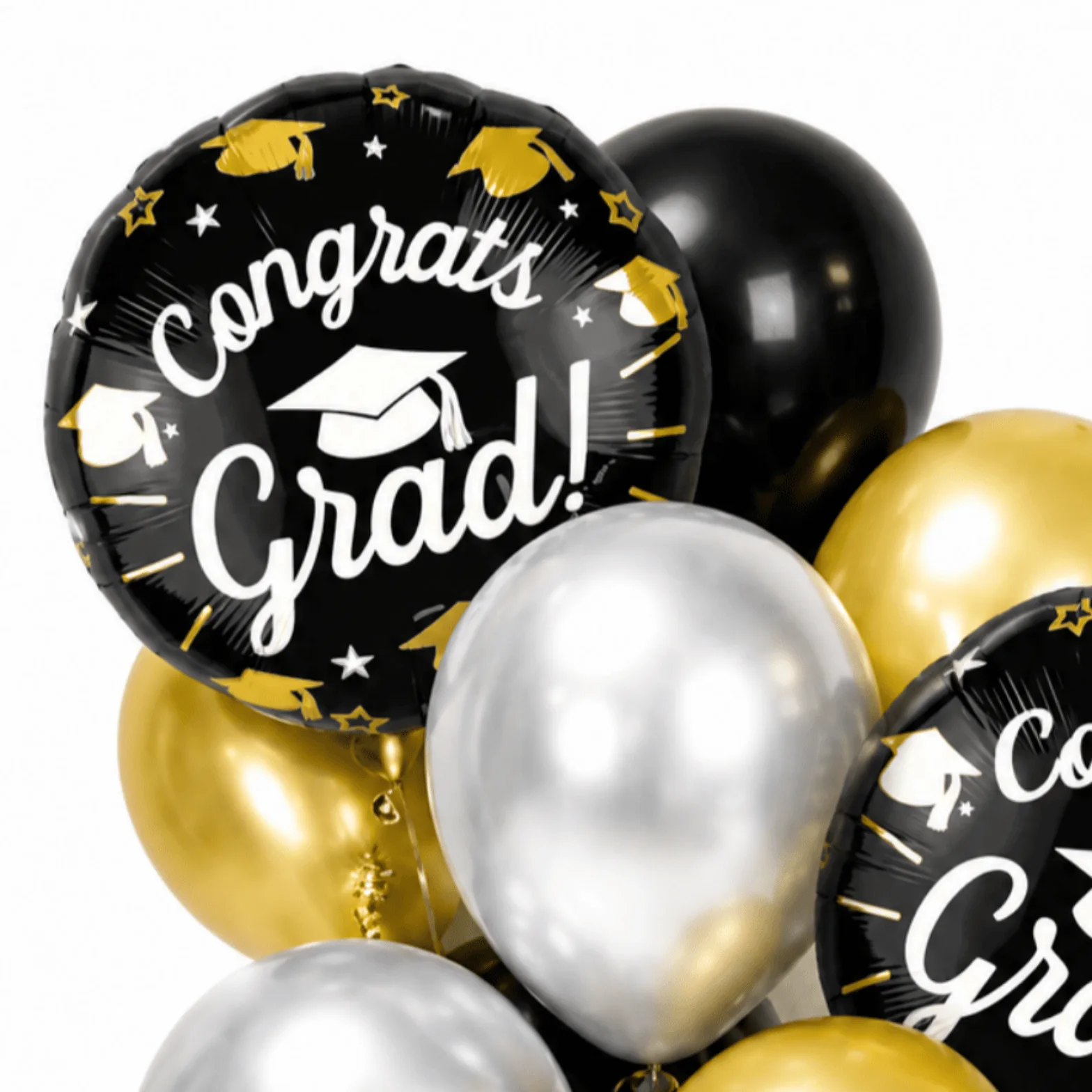 Close-up of black, gold and silver Congrats Grad helium balloon bouquet for graduation celebration.
