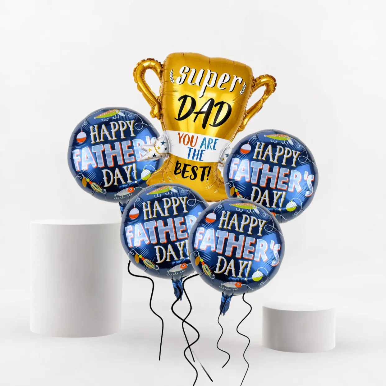 Super Dad trophy foil balloon bouquet with Happy Father’s Day blue balloons on a white display setup.