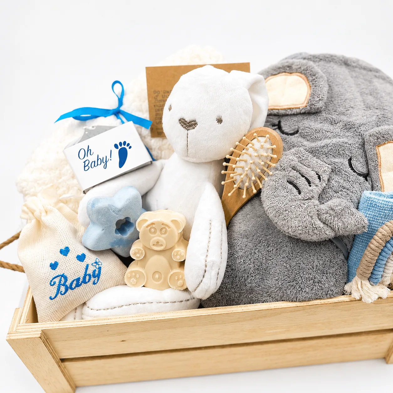 Elegant baby boy gift basket with soft elephant design for newborn celebrations