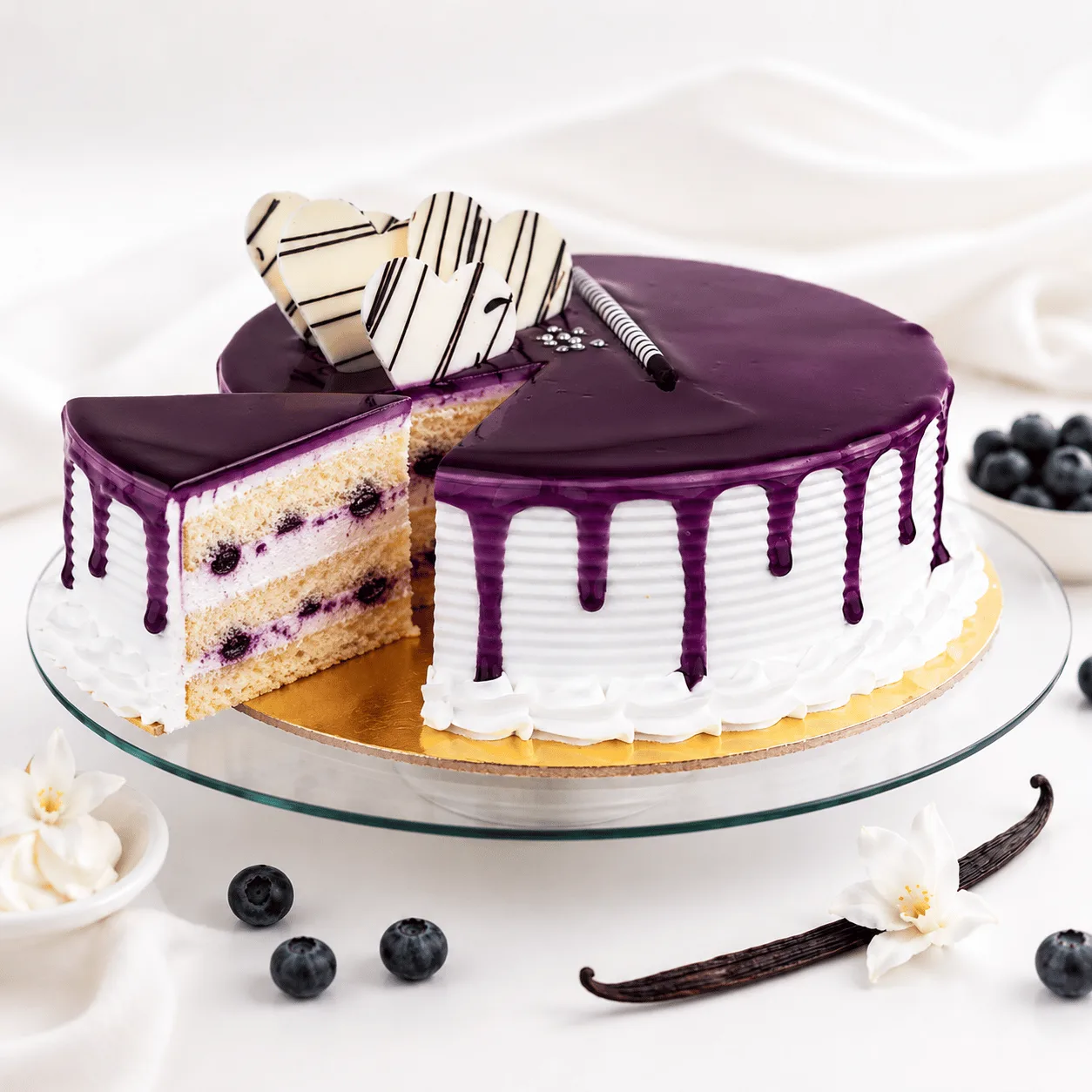 Fresh blueberry vanilla cake with creamy frosting for celebration gifting