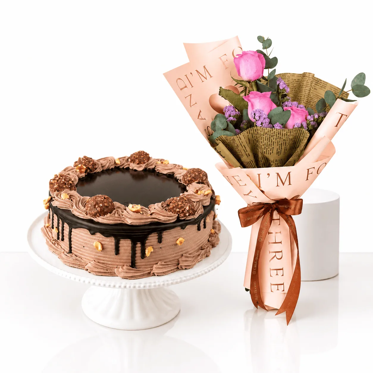 Ferrero Rocher Cake and Pink Rose Bouquet Combo for birthdays and celebrations