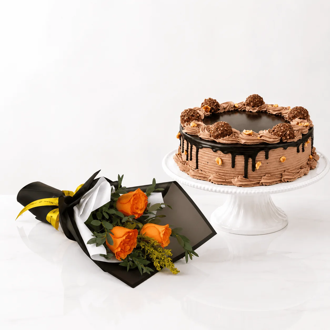 Ferrero Rocher Cake and Orange Rose Bouquet Combo for birthdays and celebrations