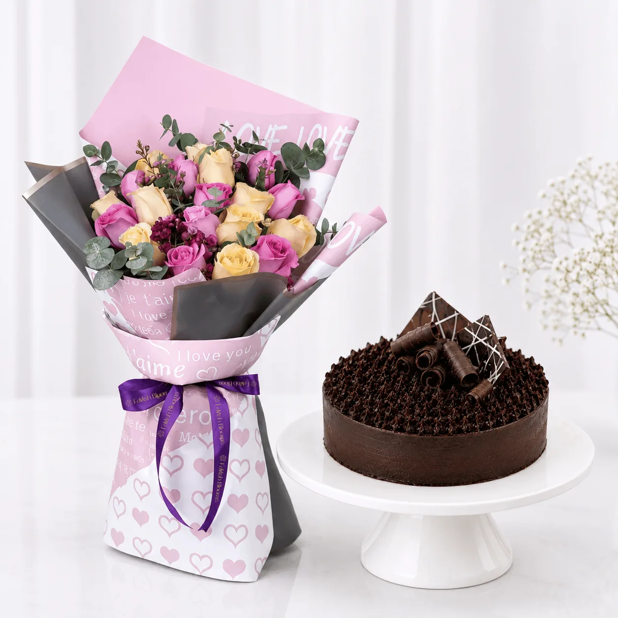 Elegant cake and peach pink roses combo gift for anniversaries and special occasions