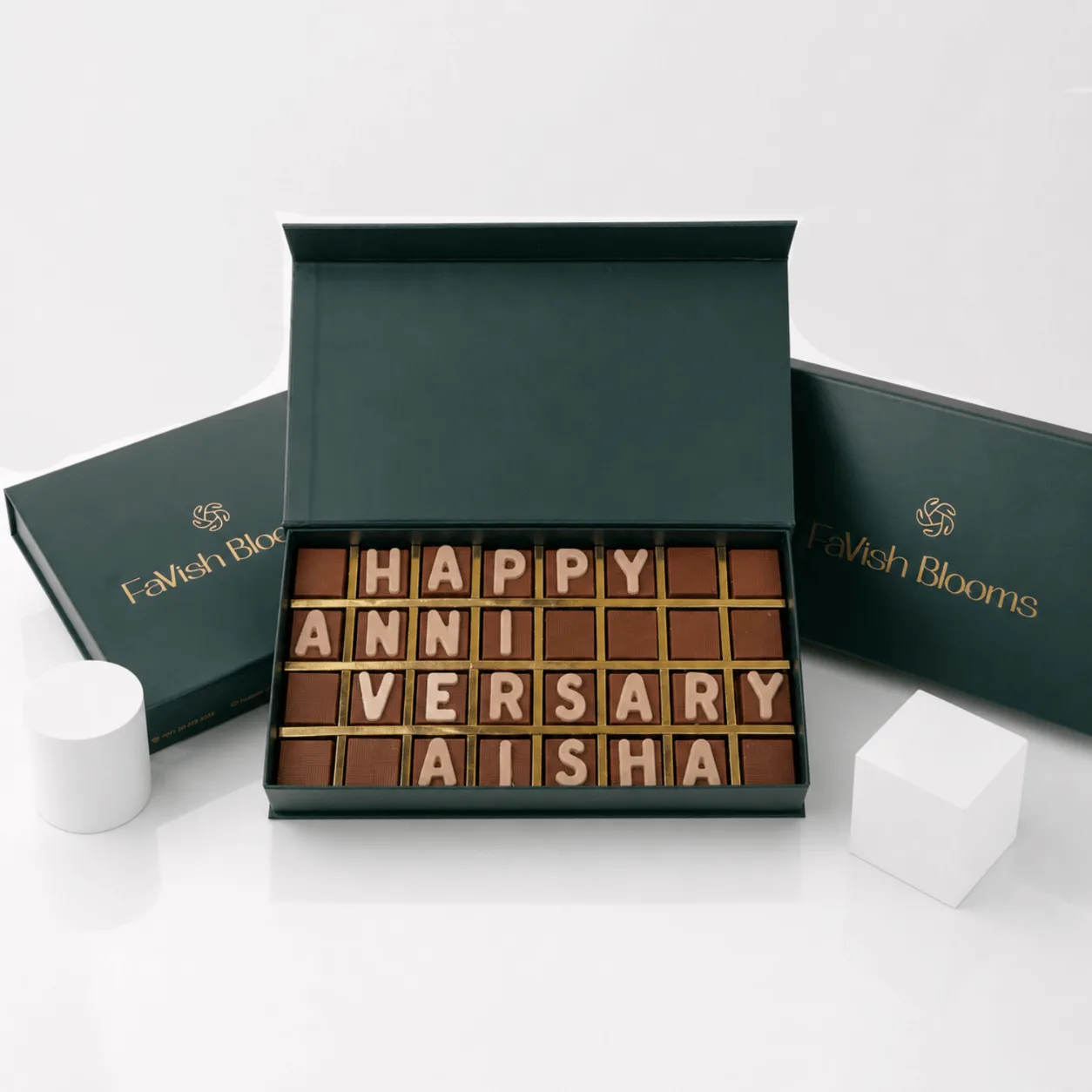Personalized "Happy Anniversary" chocolate letter box by FaVish Blooms