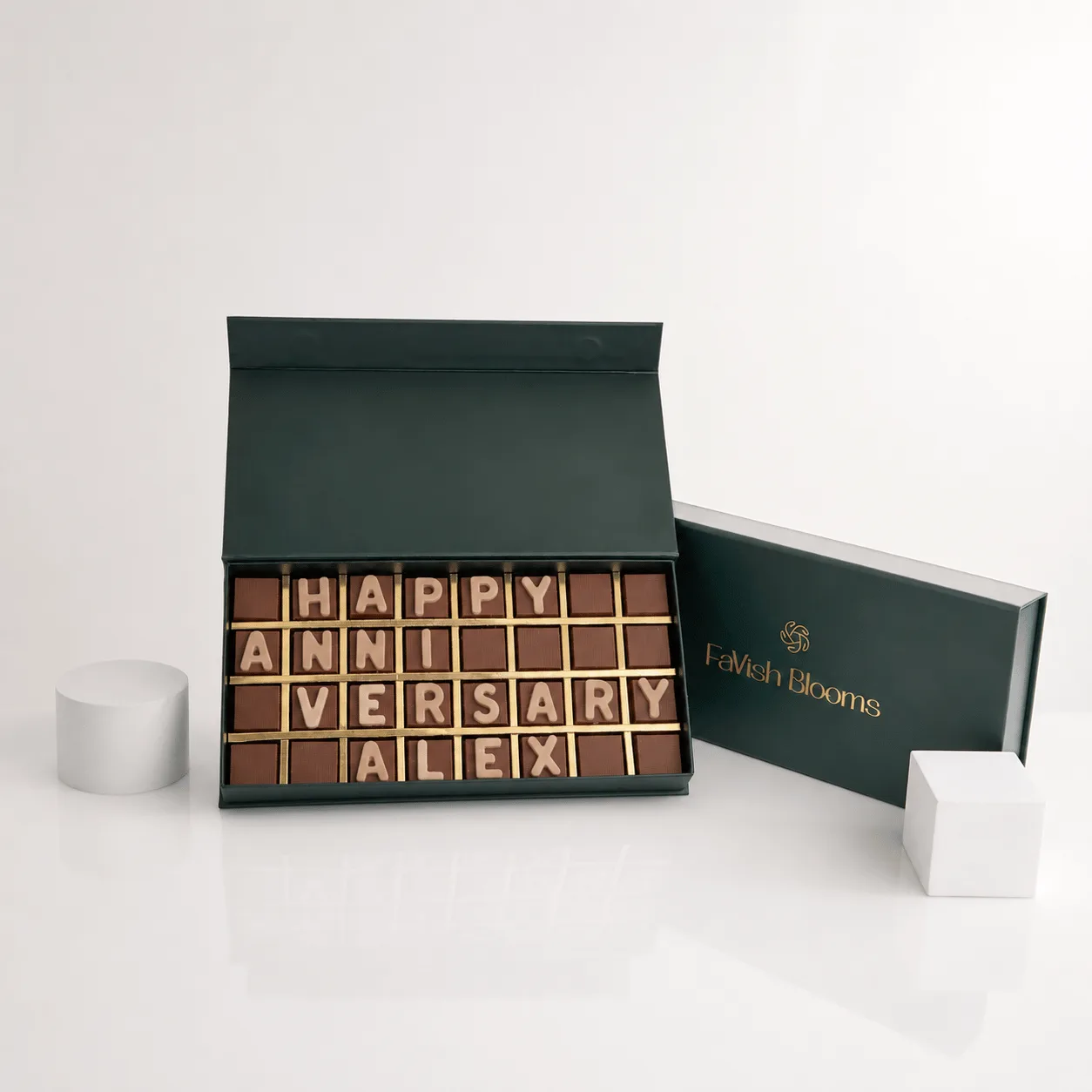 Personalized "Happy Anniversary" chocolate letter box by FaVish Blooms
