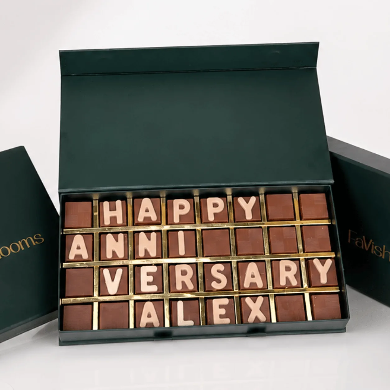 Close-up of personalized "Happy Anniversary" chocolate letter box