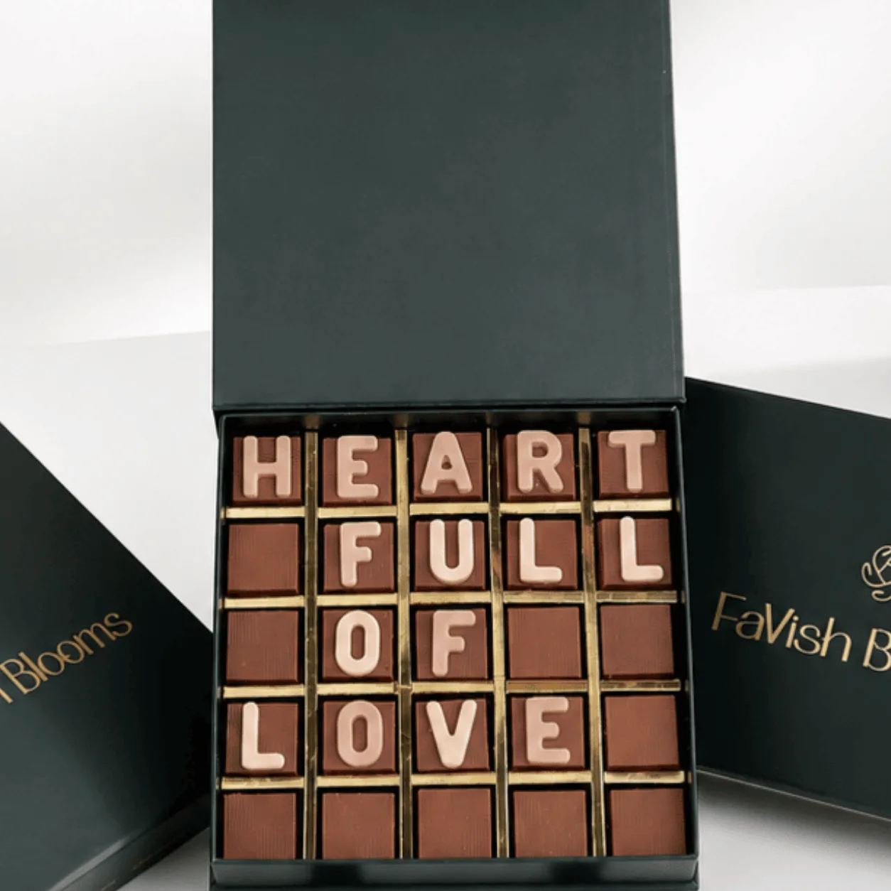 Top view of "Heart Full of Love" chocolate letters in gift box