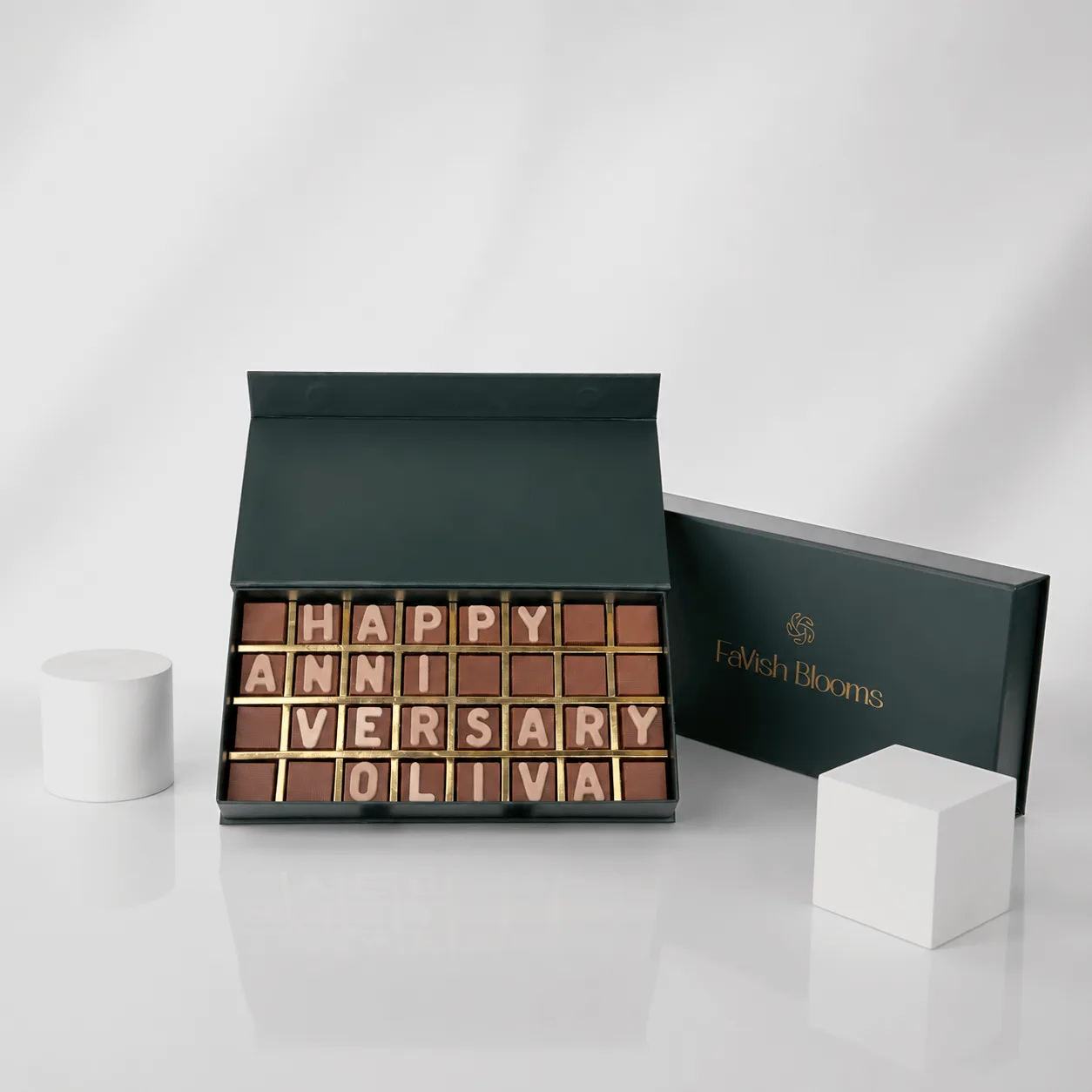 Personalized "Happy Anniversary" chocolate letter box by FaVish Blooms