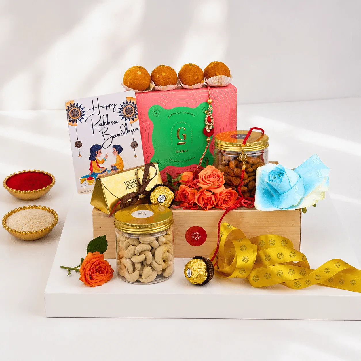 Rakhi Sweets & Dry Fruits Hamper with premium mithai, assorted nuts, and festive rakhi gift packaging