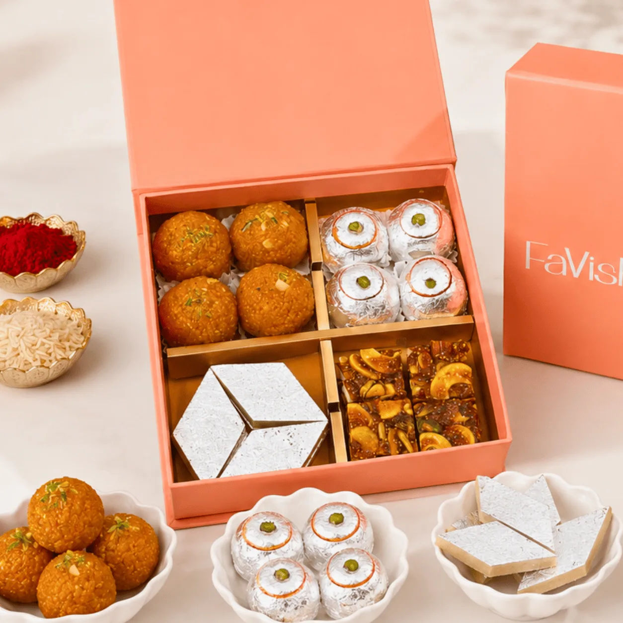 Premium Rakhi sweets gift box with assorted mithai and festive presentation