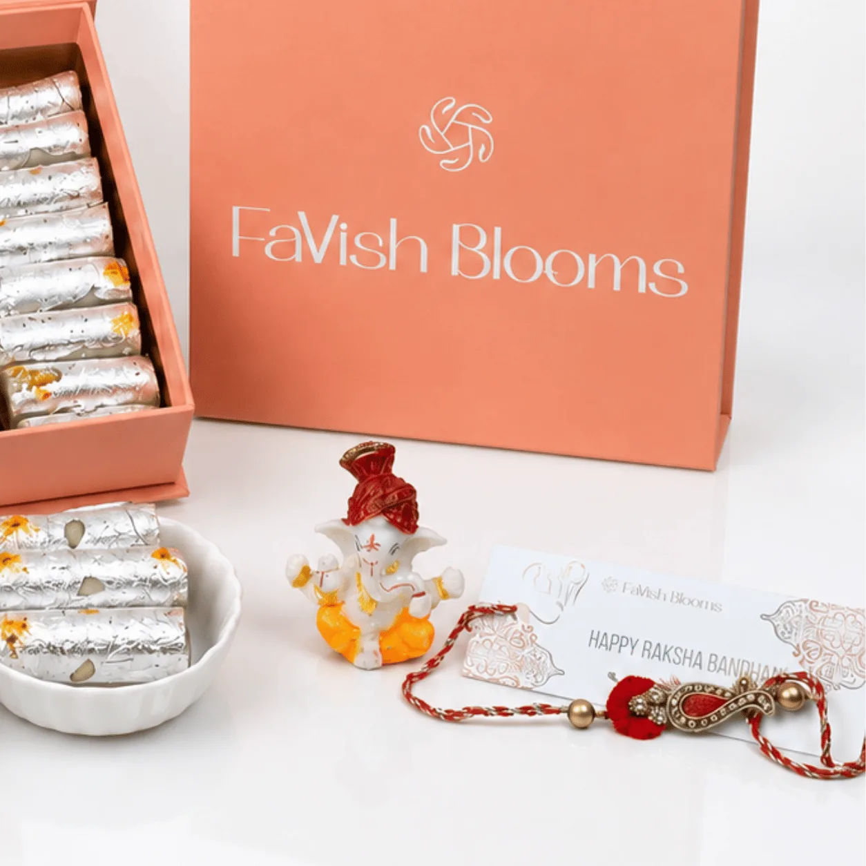 Premium Rakhi Sweets Gift Box with Lord Ganesha Idol