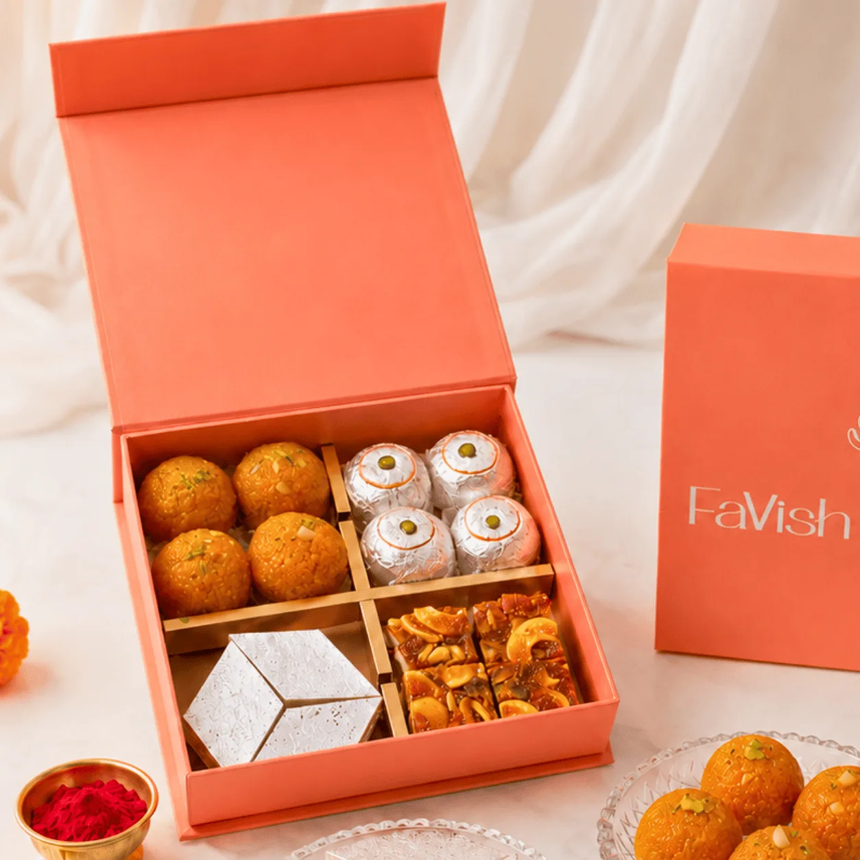 Festive kids Rakhi mithai box with aeroplane Rakhi, elephant Rakhi, and sweets