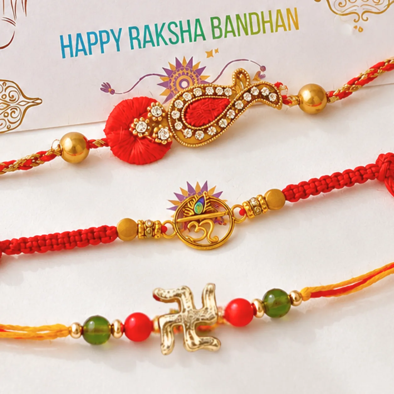 Elegant Set of 3 Traditional Rakhis presented for brothers with classic Raksha Bandhan styling