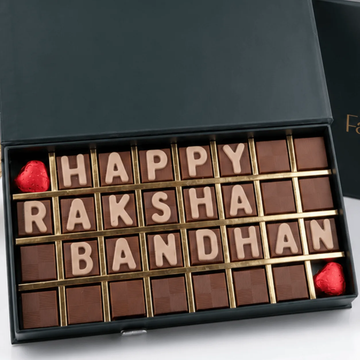 Luxury Happy Raksha Bandhan Chocolate Gift Box 32 Pcs by FaVish Blooms with festive presentation